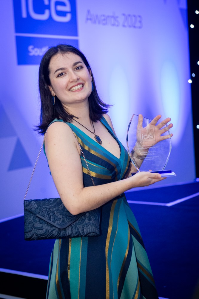 Maddie Eaves, Civil Engineer, with her award for ICE South West Graduate of the Year 